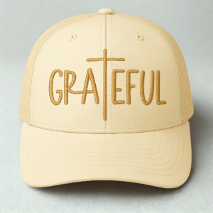 Beige cap with "Grateful" and cross design.