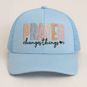 Blue cap with "Prayer changes things" text.