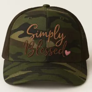 Camouflage hat with "Simply Blessed" text.
