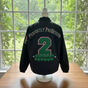 Black jacket with large green "2" on mannequin