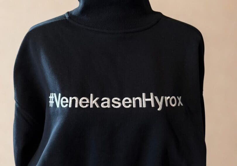 A black sweater with the words " fenekasenhyrbok ".